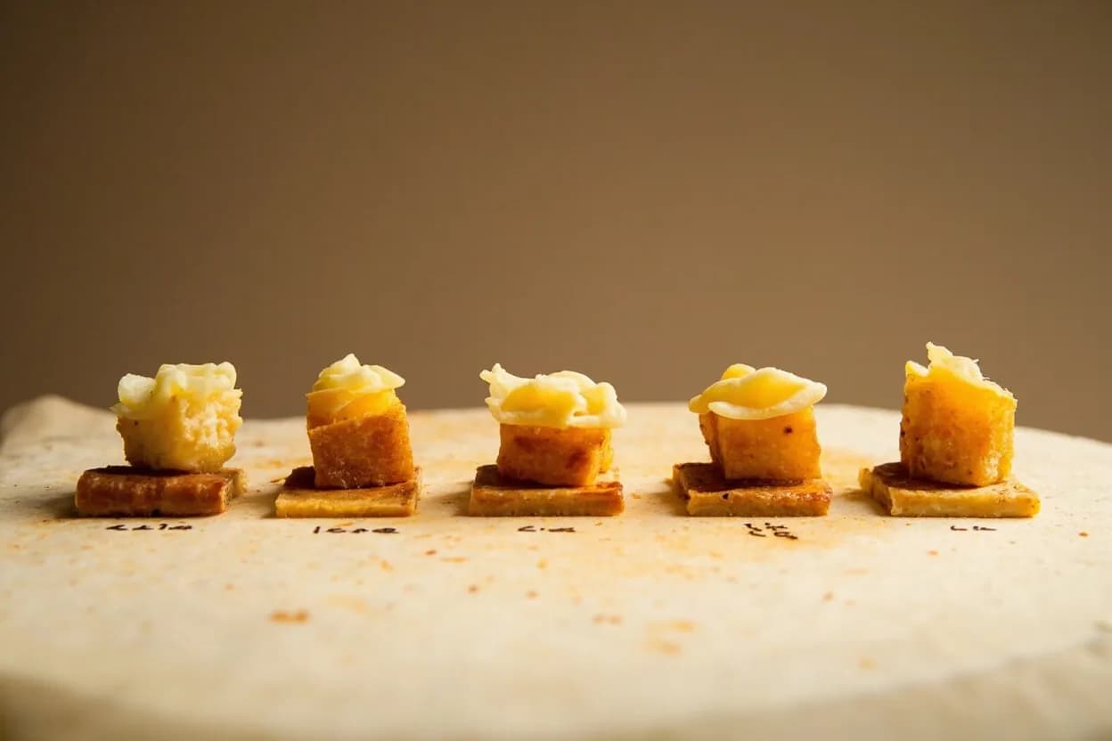 Fondue Service Temperature in context — the stages just below and above, side-by-side. Fondue service temperature is the thermal range at which a prepared cheese-and-wine emulsion maintains its homogenous, dippable consistency at table. Target reference 60–70°C (140–158°F).