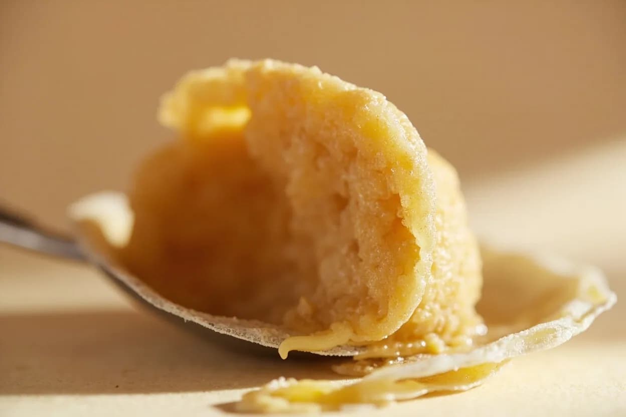 Pastry Cream Set Point at 82°C / 180°F. Below 82°C, cornstarch granules have swollen but not fully ruptured, leaving a starchy, under-gelatinized texture that may thin during storage as alpha-amylase degrades the starch chains. Visual cues: Cream thickens visibly and begins to 'heave' with large, slow bubbles rather than a rolling boil — this signals gelatinization is complete, Finished cream coats a spoon thickly and a clean line drawn through the coating does not fill in, Glossy, smooth sheen — not dull or lumpy — indicates properly hydrated starch.